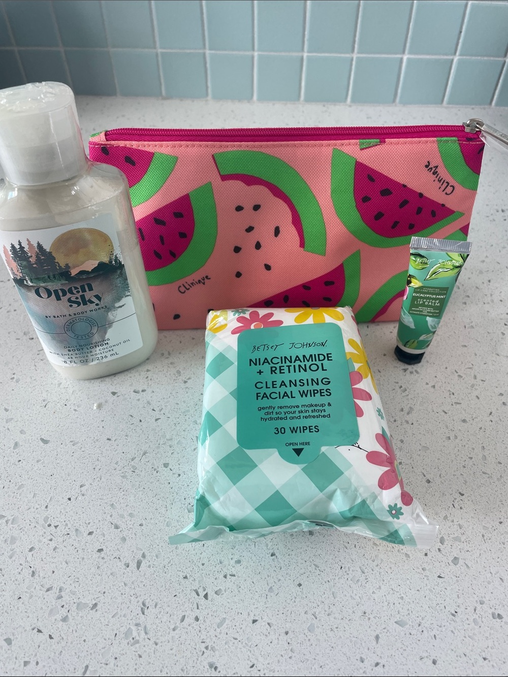 Bundle -Clinique Makeup bag, BBW lotion, Betsey Johnson face wipes, and lip balm